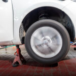 Car,Mechanic,Testing,The,Brake,On,Car,Wheel,On,The